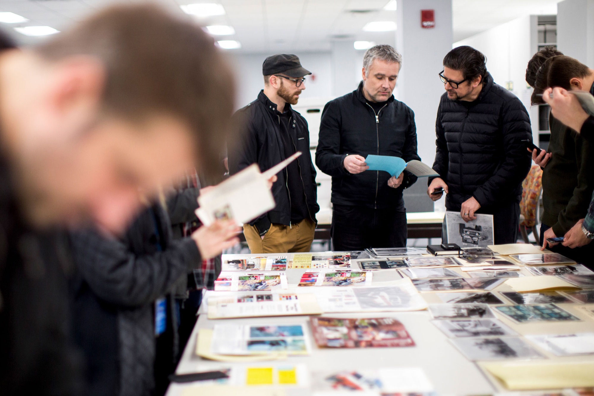 Paul Wraith and Ford designers reviewing archival Bronco material
