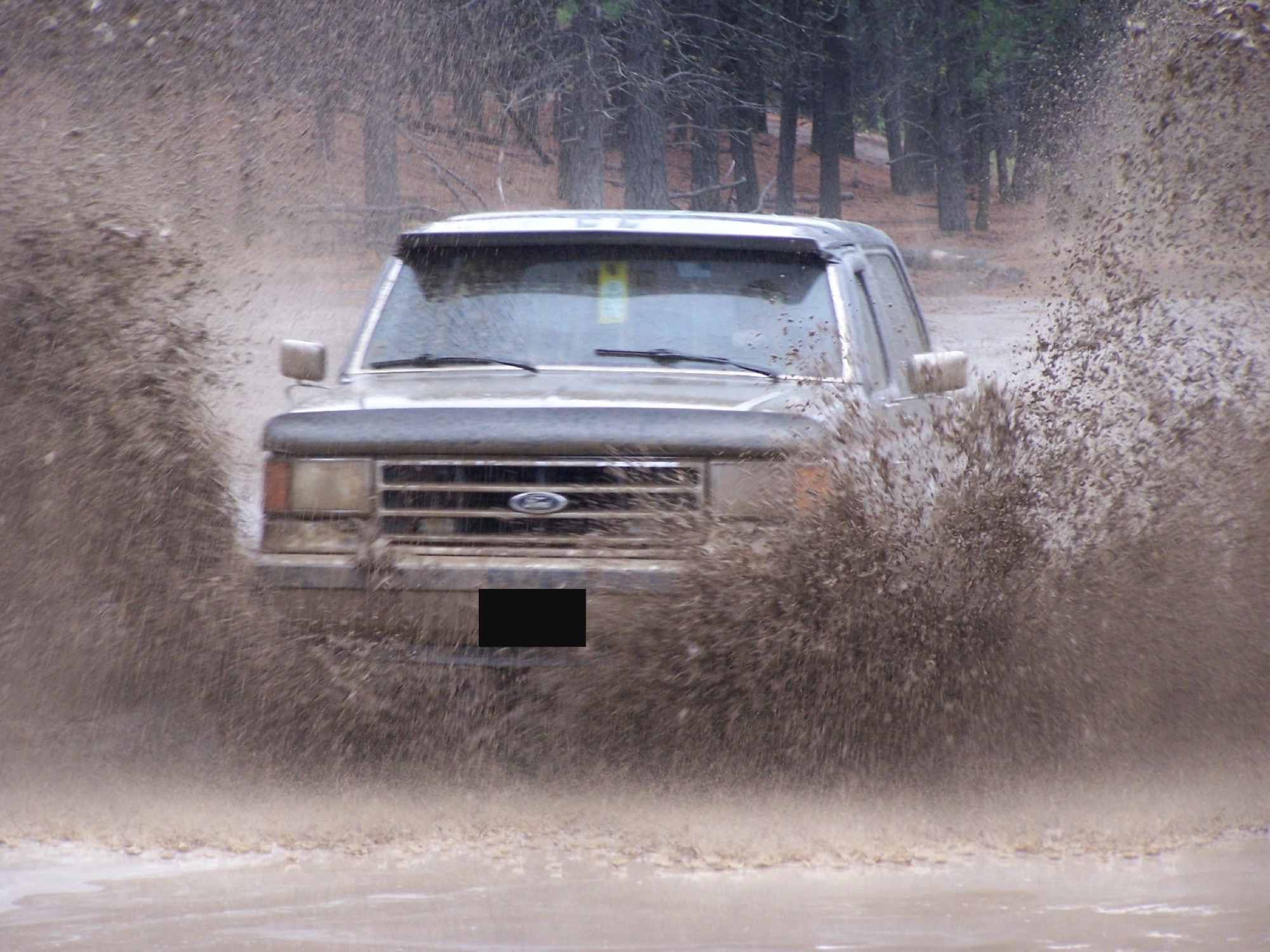 1989 Ford Bronco, action shot mid-splash, Riverside State Park, Spokane, WA (Nov 2012)